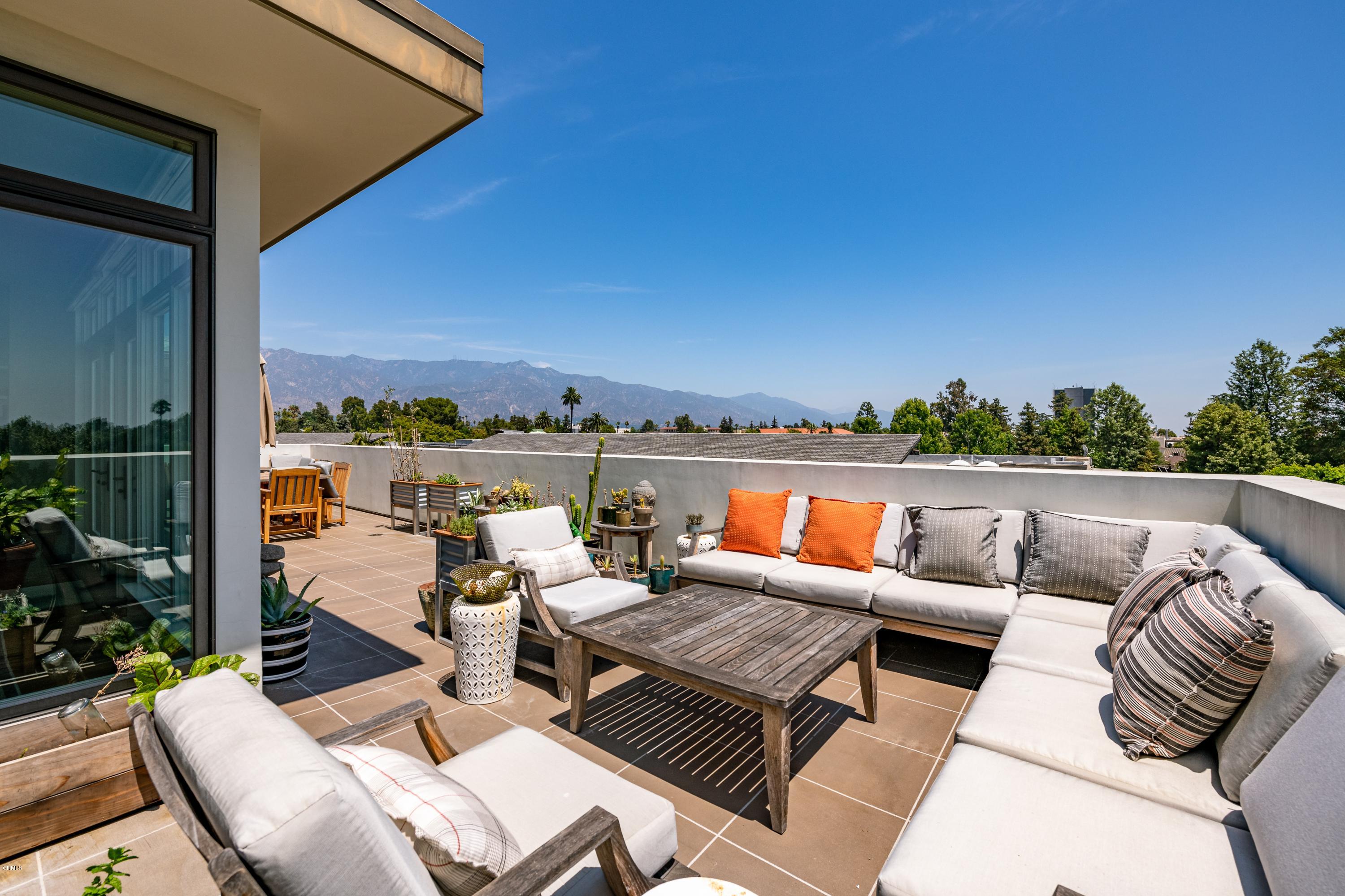 920 Granite Drive, Unit 509 Pasadena, CA 91101 - Photo 23 of 26 a view of roof deck with couches and city view