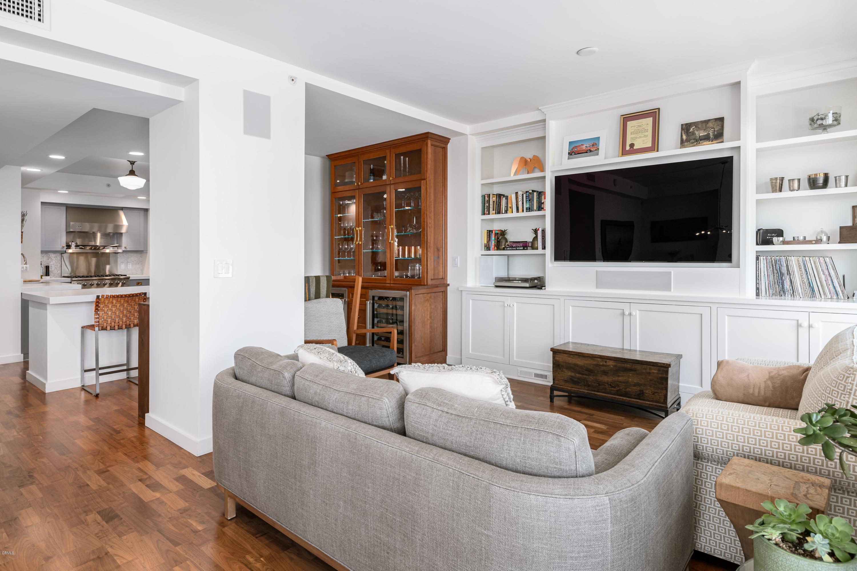 920 Granite Drive, Unit 509 Pasadena, CA 91101 - Photo 9 of 26 a living room with furniture and a flat screen tv