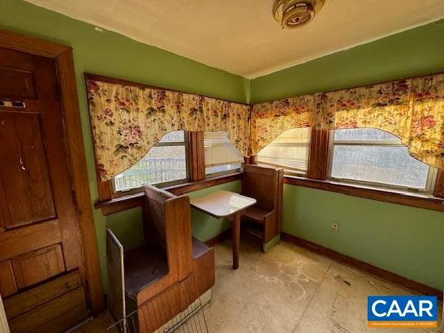 a view of a living room with a large window