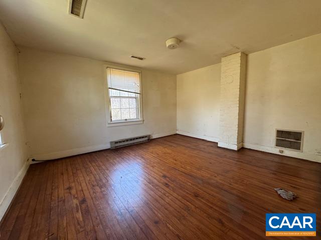 4473 Old Sand Road Schuyler, VA 22969 - Photo 5 of 10 an empty room with wooden floor and window