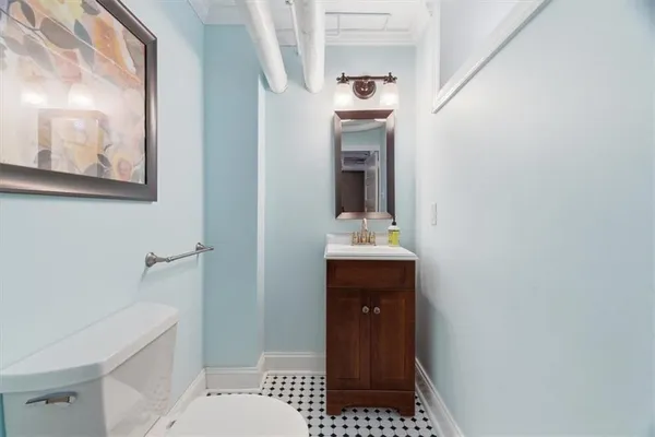 a view of a backyard with sitting area and garden