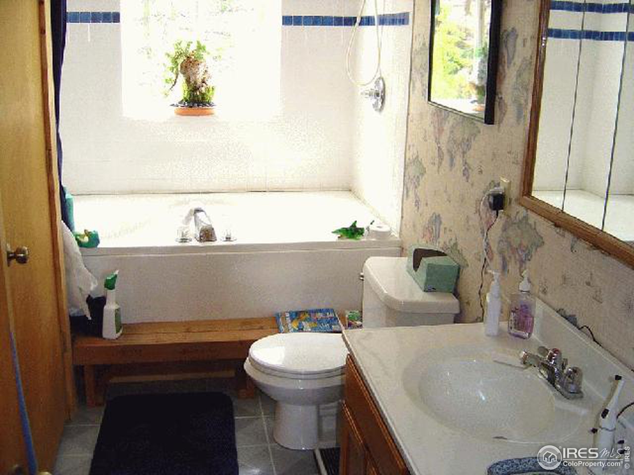 15855 Rist Canyon Road Bellvue, CO 80512 - Photo 7 of 12 a bathroom with a sink and a mirror