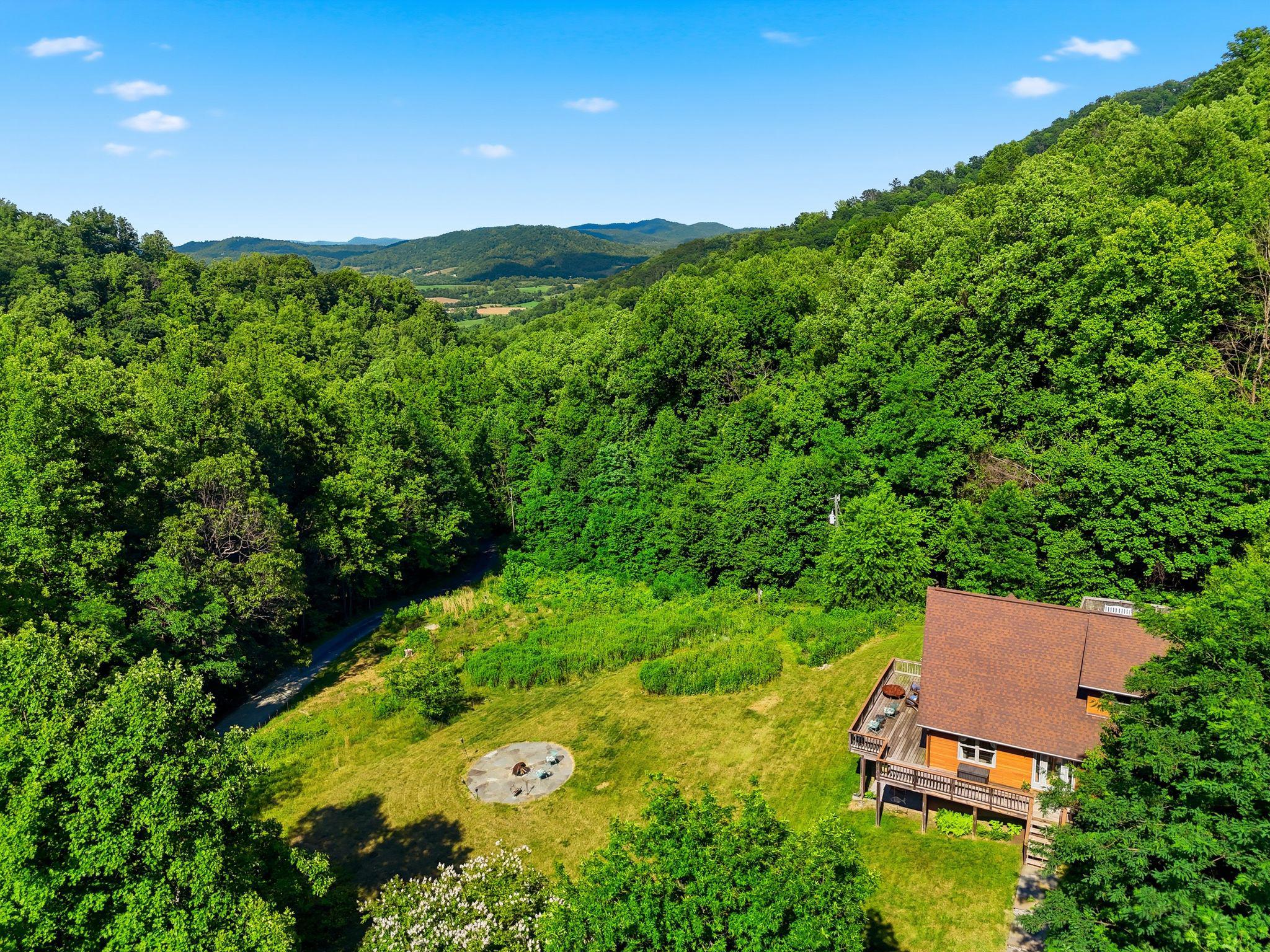 2411 Quaker Run Road Syria, VA 22743 - Photo 53 of 56 Secluded retreat amidst lush greenery.