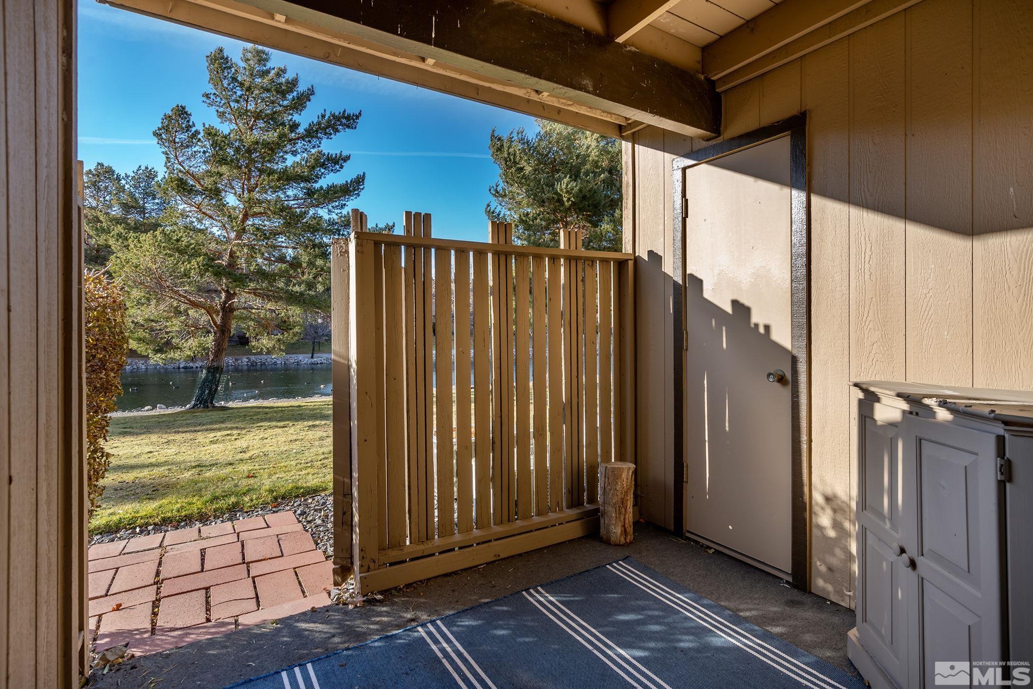 4893 Reggie Road Reno, NV 89502 - Photo 12 of 27 a view of a balcony with wooden floor