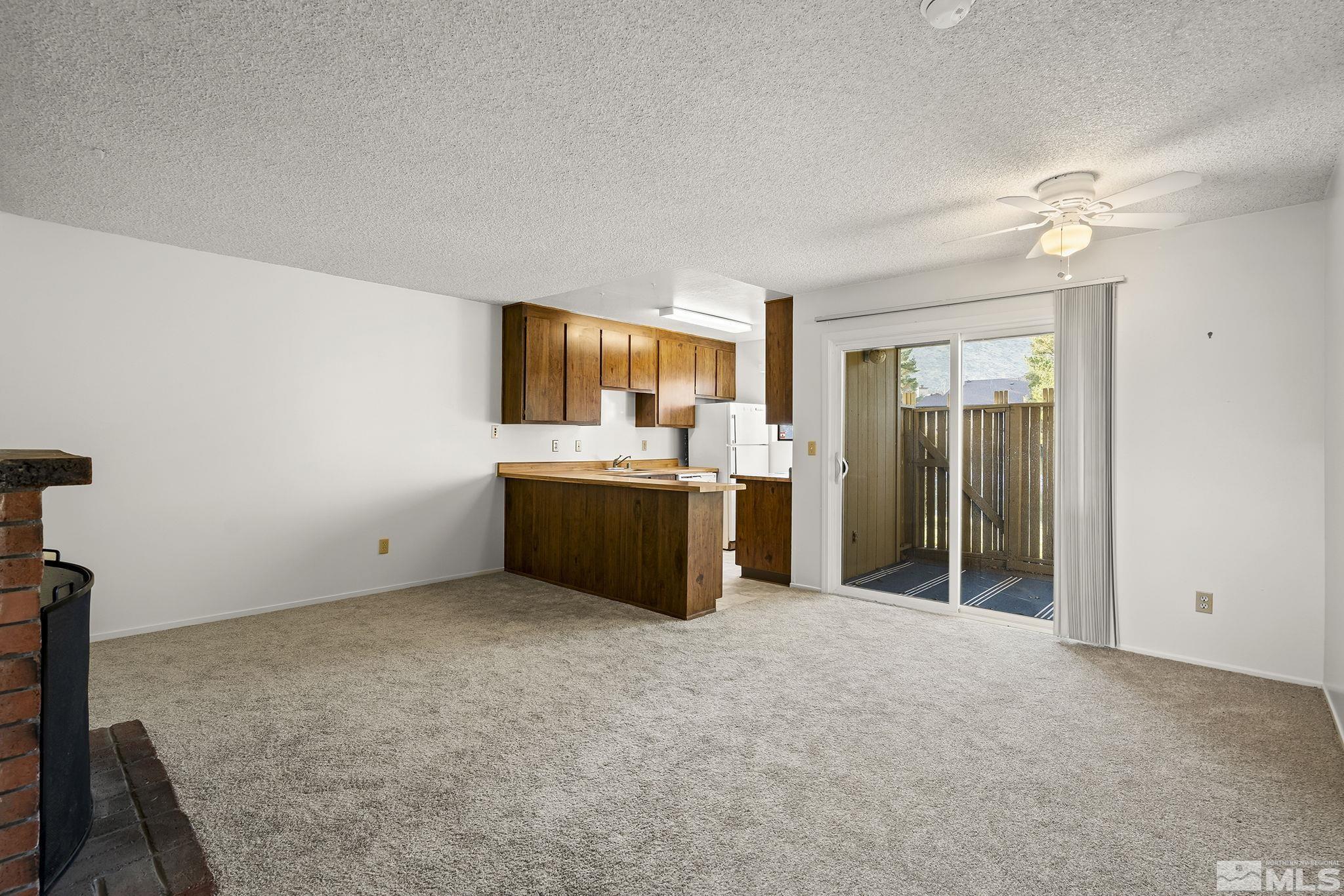 4893 Reggie Road Reno, NV 89502 - Photo 2 of 27 a view of a room with a sink and cabinet