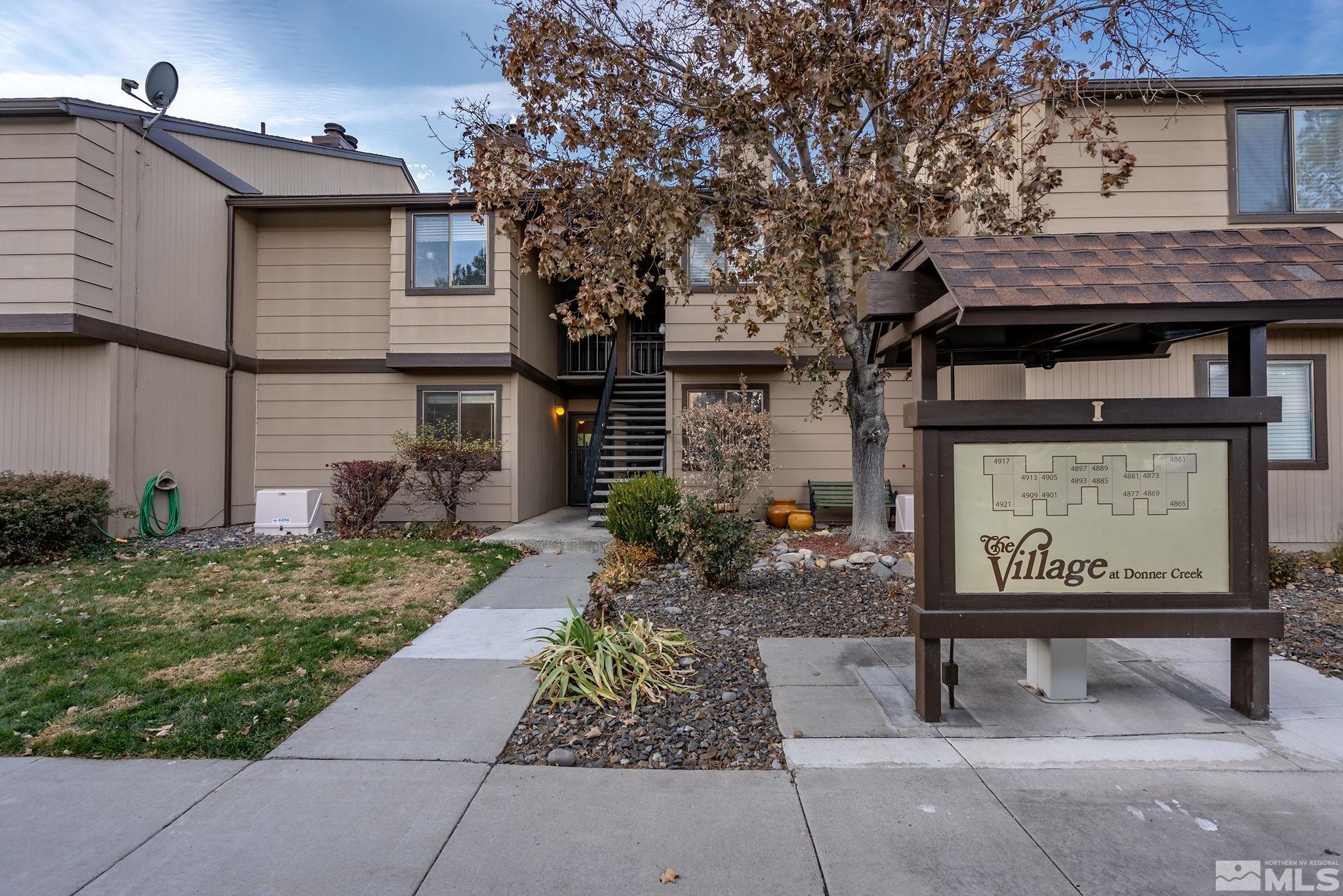 4893 Reggie Road Reno, NV 89502 - Photo 27 of 27 a view of a pathway along the house