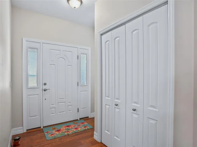a kitchen with granite countertop stainless steel appliances and wooden cabinets