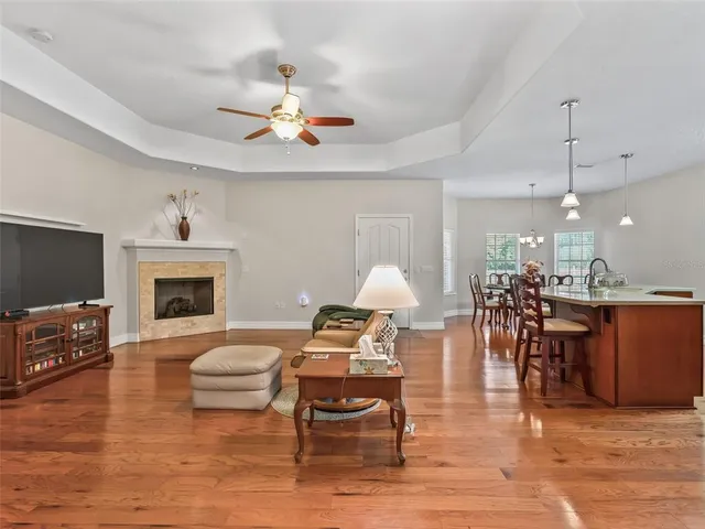a kitchen with stainless steel appliances granite countertop a refrigerator stove and sink
