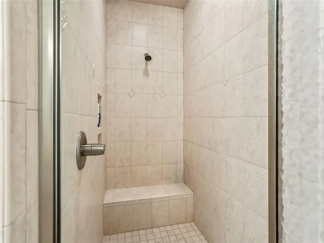 a front view of house with a garden