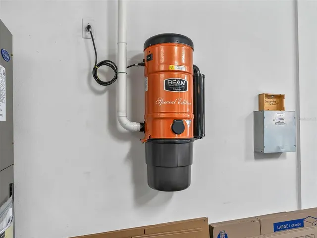 a view of a park with a tree in the background