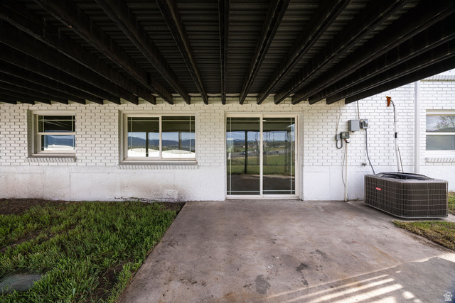 4155 Johnson Road Nibley, UT 84321 - Photo 51 of 71 Entrance to property featuring a patio area and brick siding