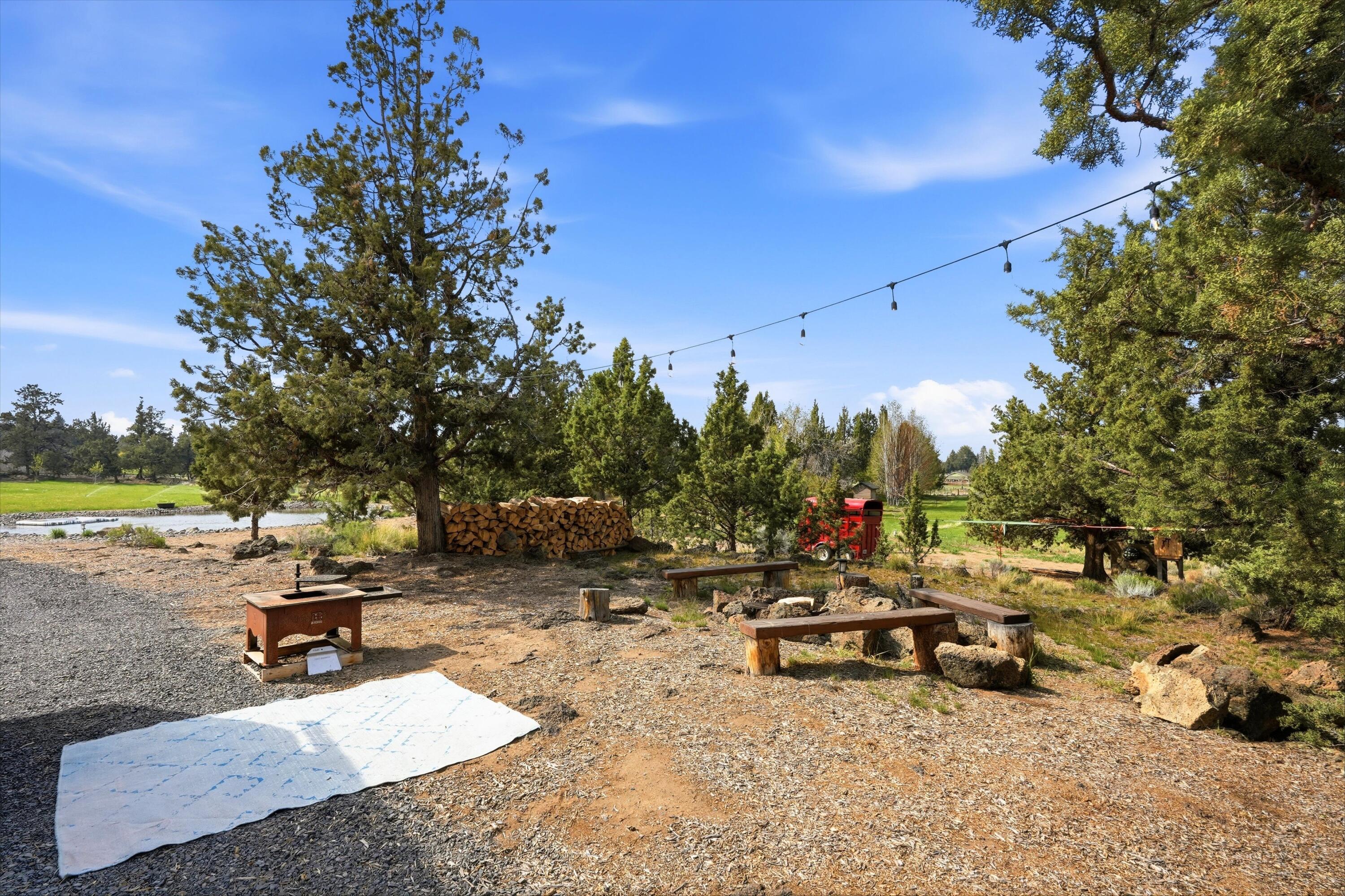 61280 Larsen Road Bend, OR 97702 - Photo 40 of 58 a view of a park with large trees