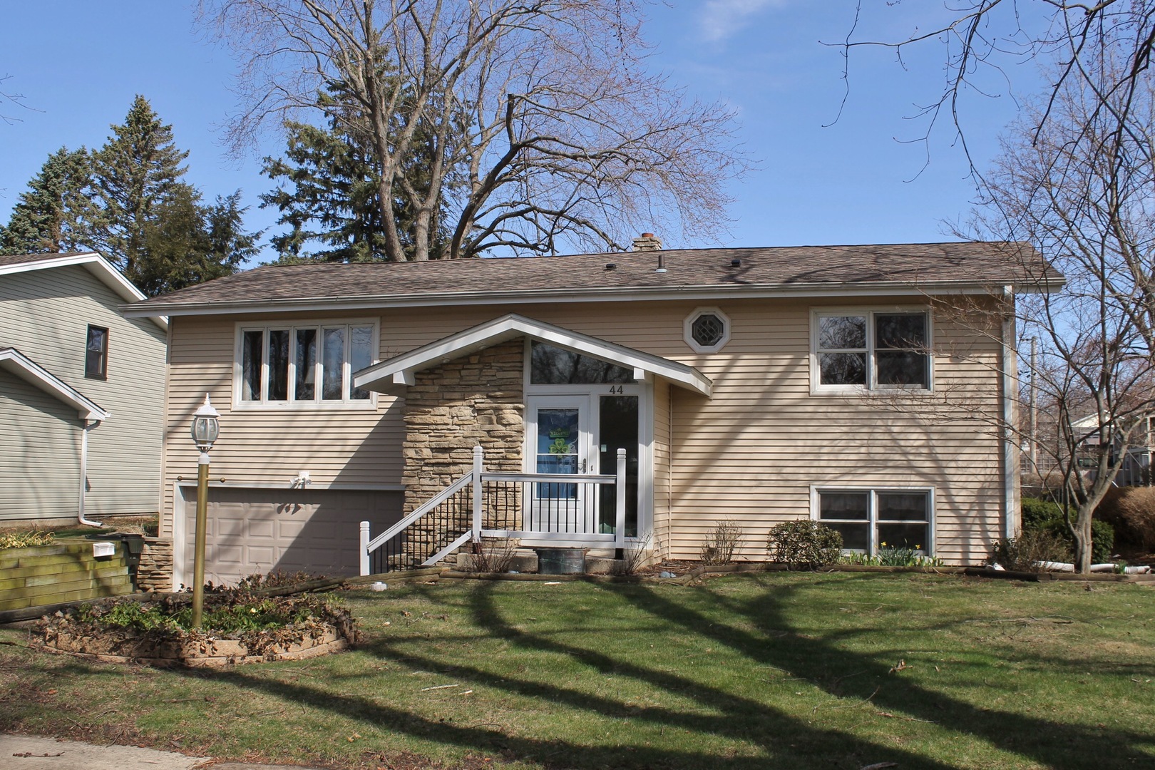 44 Sunset Drive Cary, IL 60013 - Photo 1 of 4 front view of a house with a yard