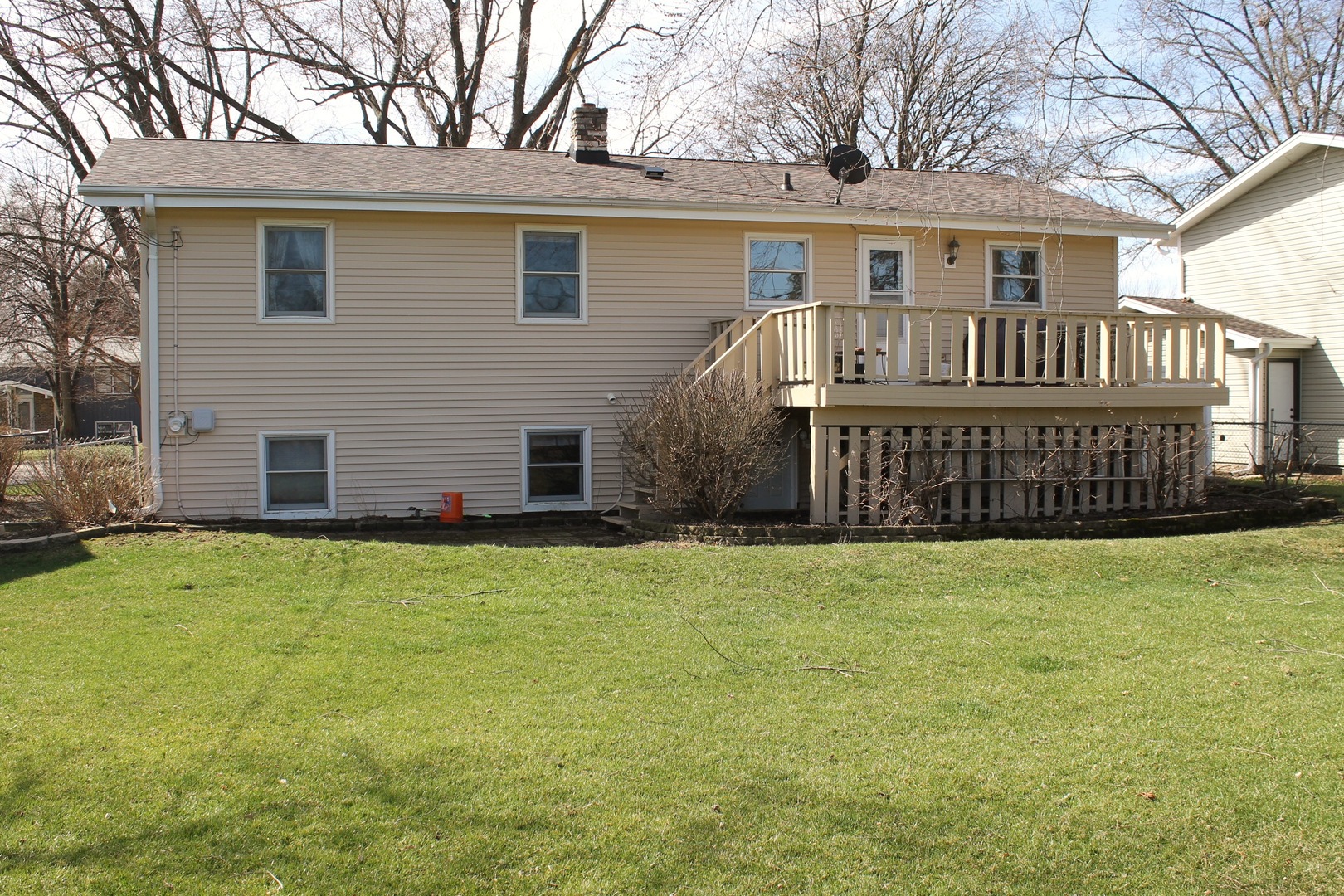 44 Sunset Drive Cary, IL 60013 - Photo 2 of 4 a front view of a house with garden