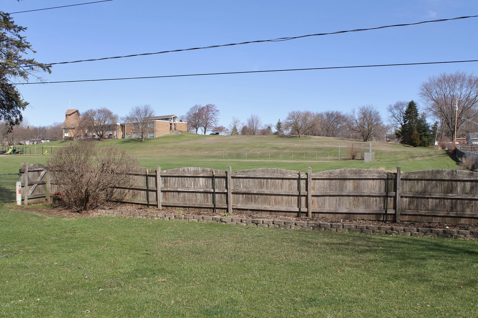 44 Sunset Drive Cary, IL 60013 - Photo 3 of 4 a view of a lake with an outdoor space