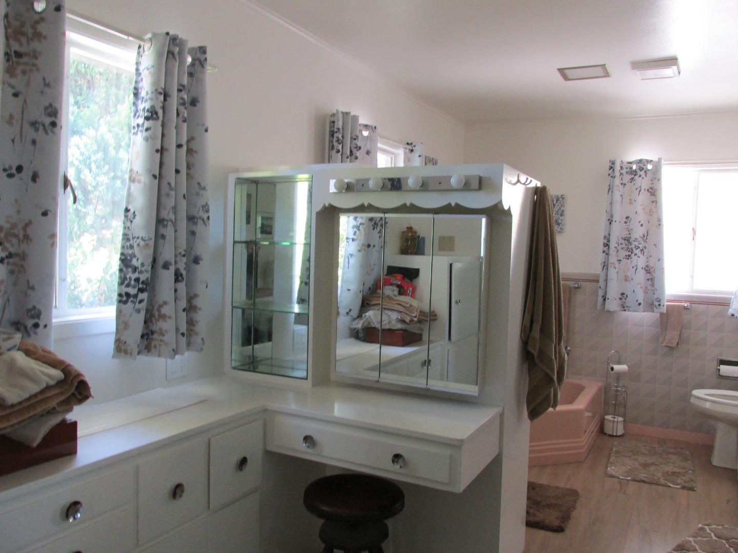 1610 Cienega Road Hollister, CA 95023 - Photo 13 of 35 a bathroom with a sink a toilet and shower
