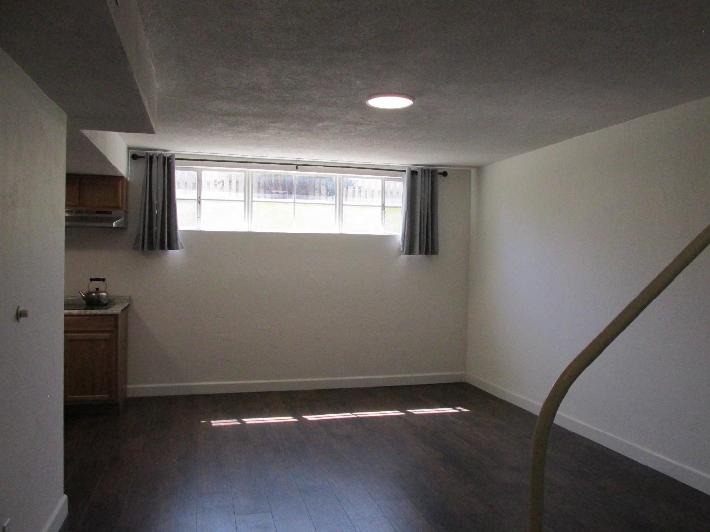 1610 Cienega Road Hollister, CA 95023 - Photo 17 of 35 a view of an empty room with a window