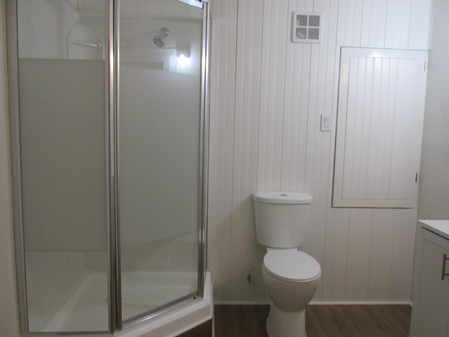 1610 Cienega Road Hollister, CA 95023 - Photo 19 of 35 a bathroom with a toilet and a sink