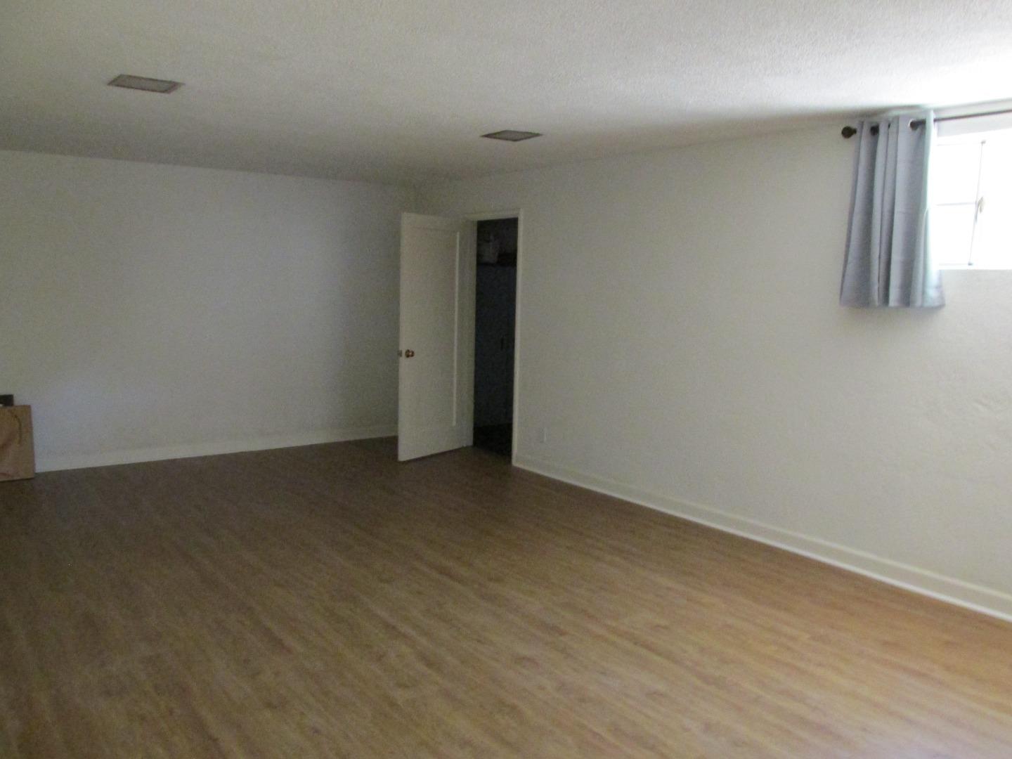 1610 Cienega Road Hollister, CA 95023 - Photo 20 of 35 a view of an empty room and a window