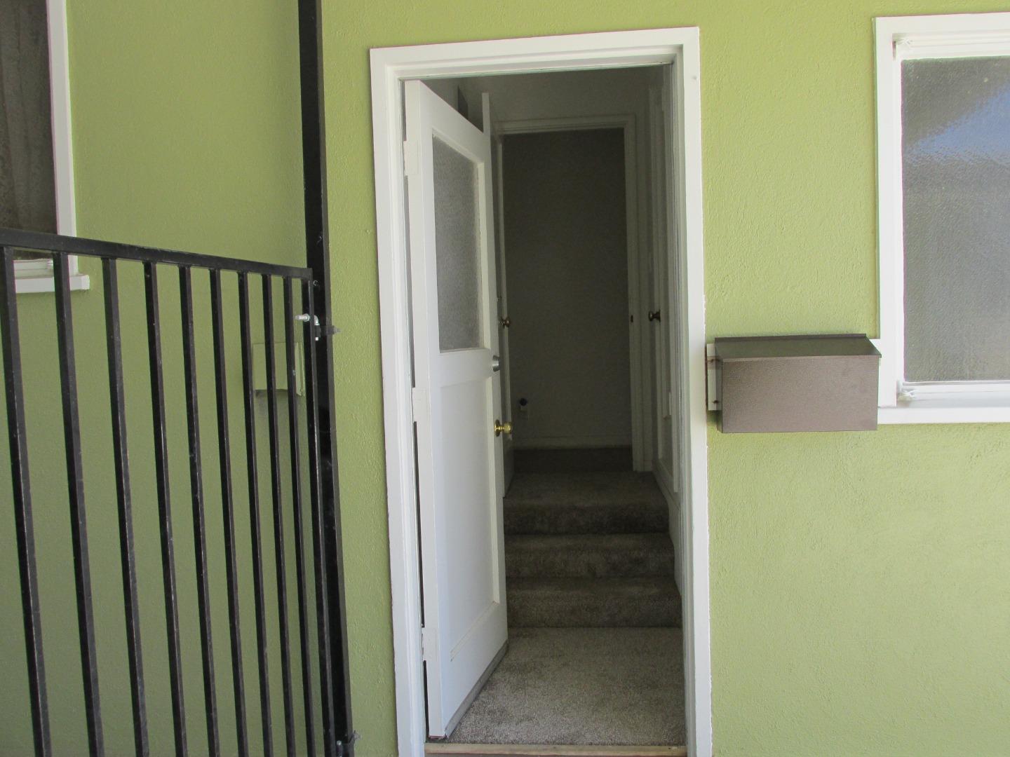 1610 Cienega Road Hollister, CA 95023 - Photo 25 of 35 a view of a porch with a wooden door