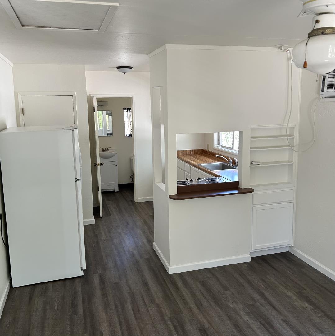 1610 Cienega Road Hollister, CA 95023 - Photo 28 of 35 a kitchen with a refrigerator and a stove