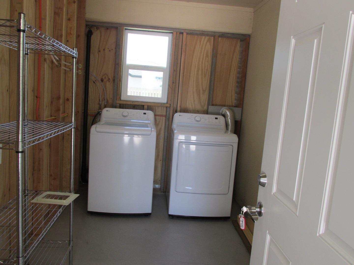1610 Cienega Road Hollister, CA 95023 - Photo 29 of 35 a utility room with dryer and washer