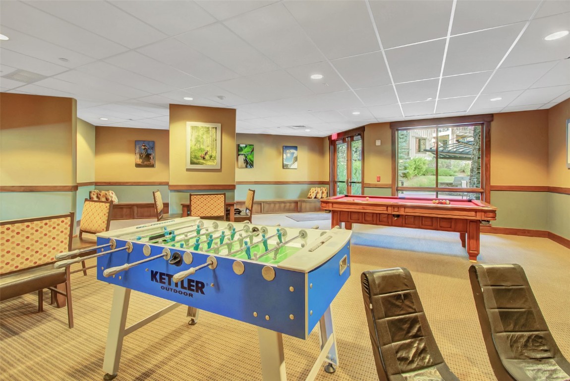 1175 Bangtail Way, Unit 4120 Steamboat Springs, CO 80487 - Photo 41 of 43 a living room filled with furniture and a couch