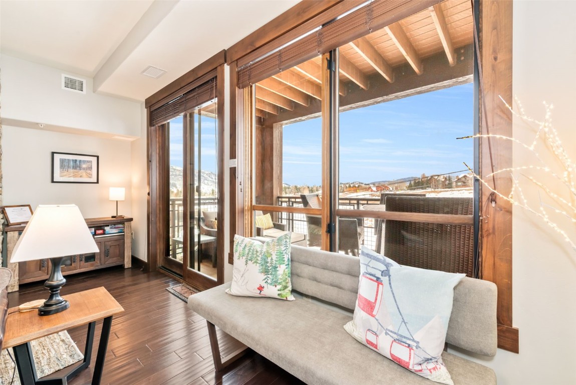 1175 Bangtail Way, Unit 4120 Steamboat Springs, CO 80487 - Photo 7 of 43 a living room with furniture and a window