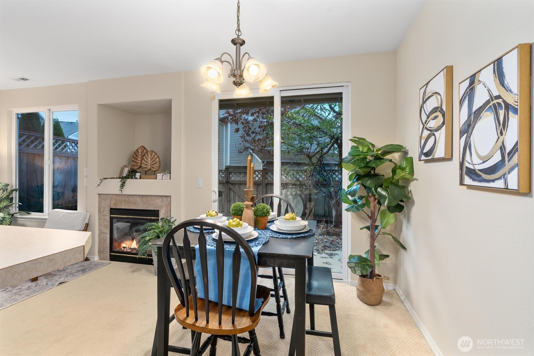 3030 Southeast 12th Street, Unit 1077 Renton, WA 98058 - Photo 12 of 36 a view of a dining room with furniture window and wooden floor