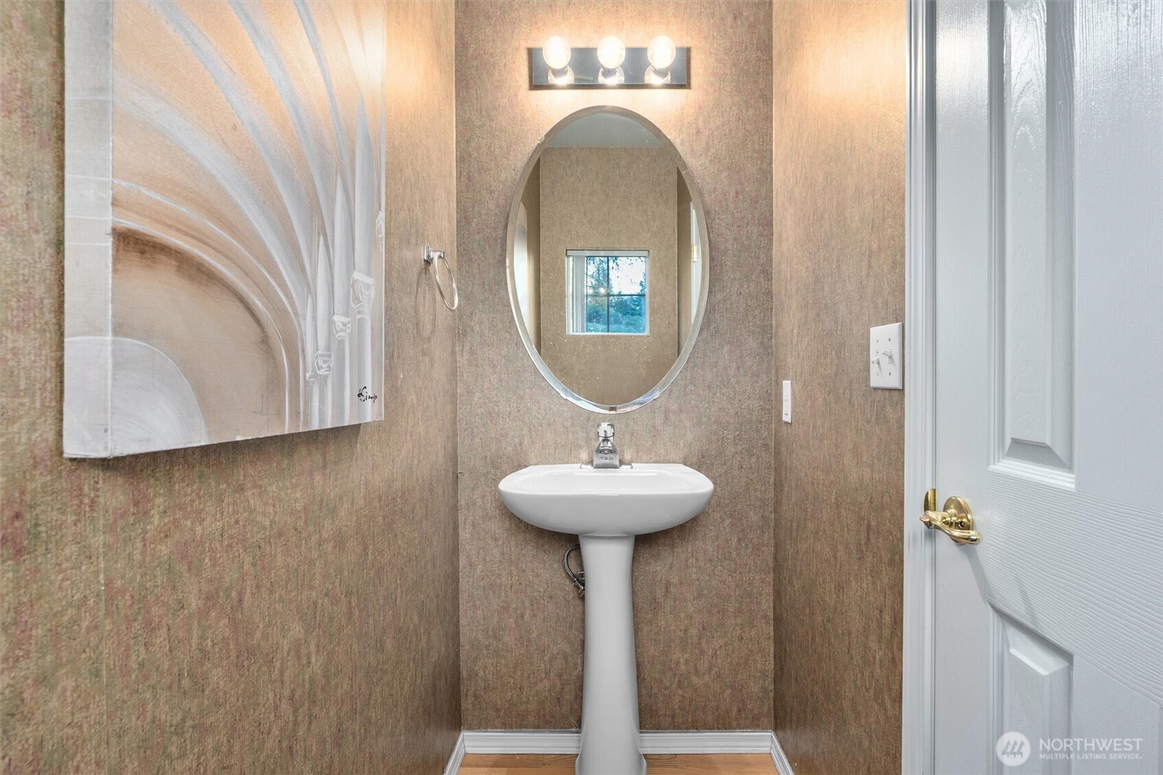 3030 Southeast 12th Street, Unit 1077 Renton, WA 98058 - Photo 18 of 36 a bathroom with a sink and a mirror