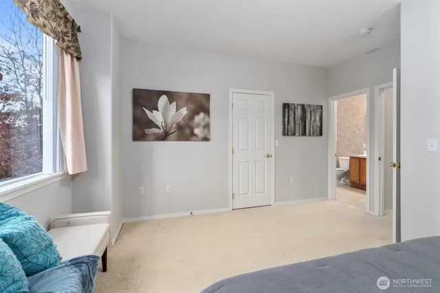 a view of livingroom with furniture and window