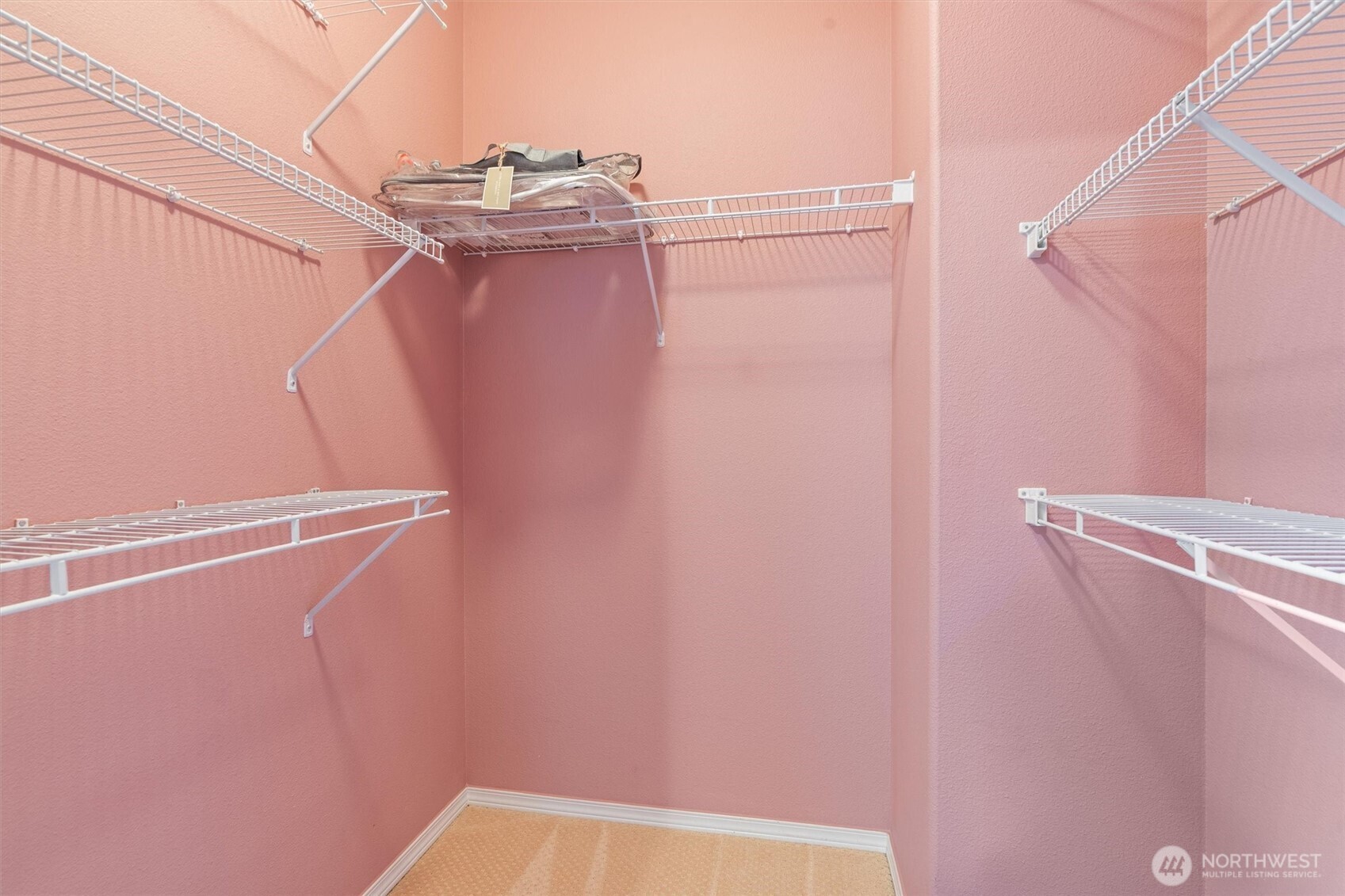 3030 Southeast 12th Street, Unit 1077 Renton, WA 98058 - Photo 23 of 36 a view of a room with racks on the wall