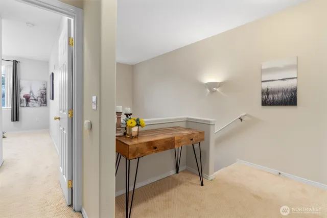 a room that has a table and a chair in it