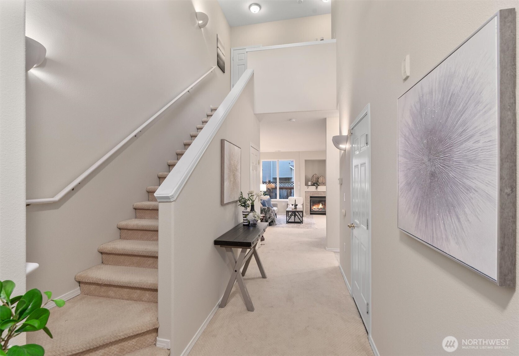 3030 Southeast 12th Street, Unit 1077 Renton, WA 98058 - Photo 6 of 36 a view of entryway and hall with wooden floor