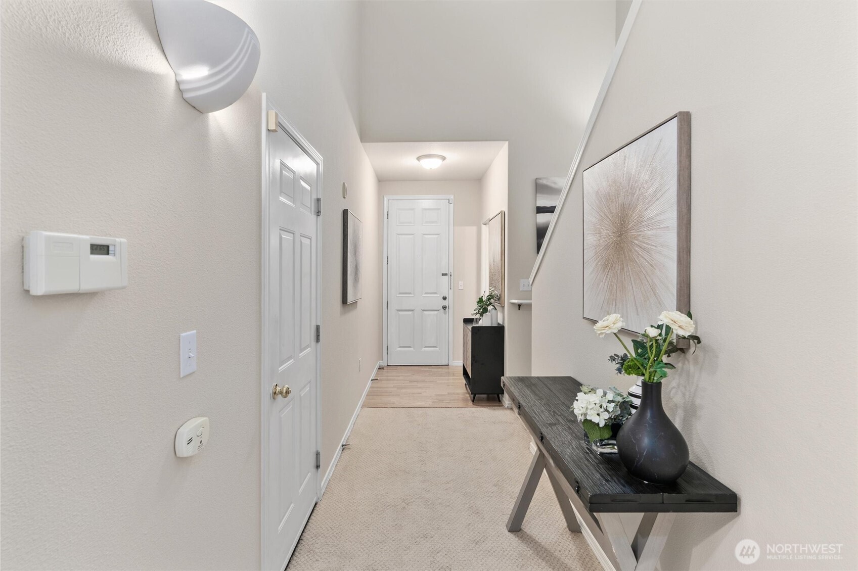 3030 Southeast 12th Street, Unit 1077 Renton, WA 98058 - Photo 7 of 36 a living room with furniture and a potted plant