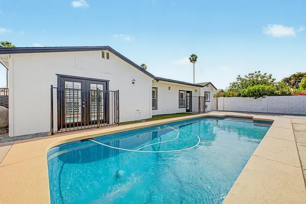 a swimming pool with yard