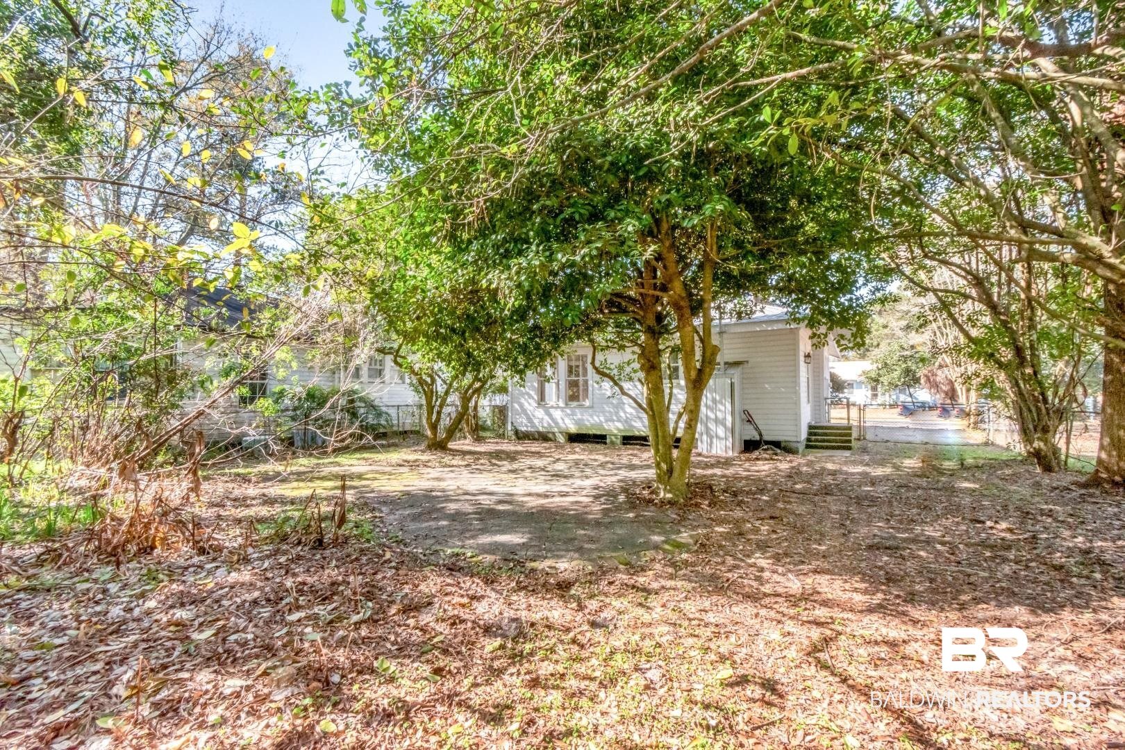 731 Jemison Street Mobile, AL 36606 - Photo 16 of 27 View of yard with a patio