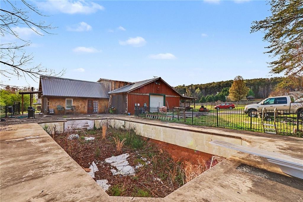 151 Sugar Hill Road Rydal, GA 30171 - Photo 12 of 15 a view of a house with swimming pool