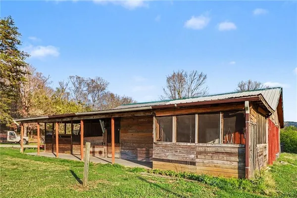 a view of front of house with a yard