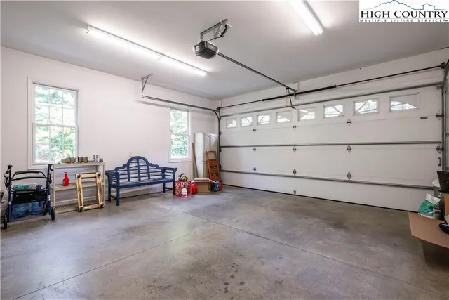 a view of a livingroom with furniture and windows