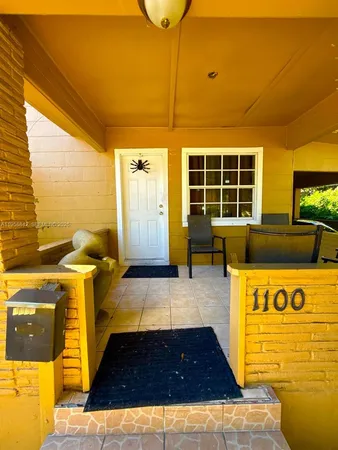 a view of a entryway door front of house