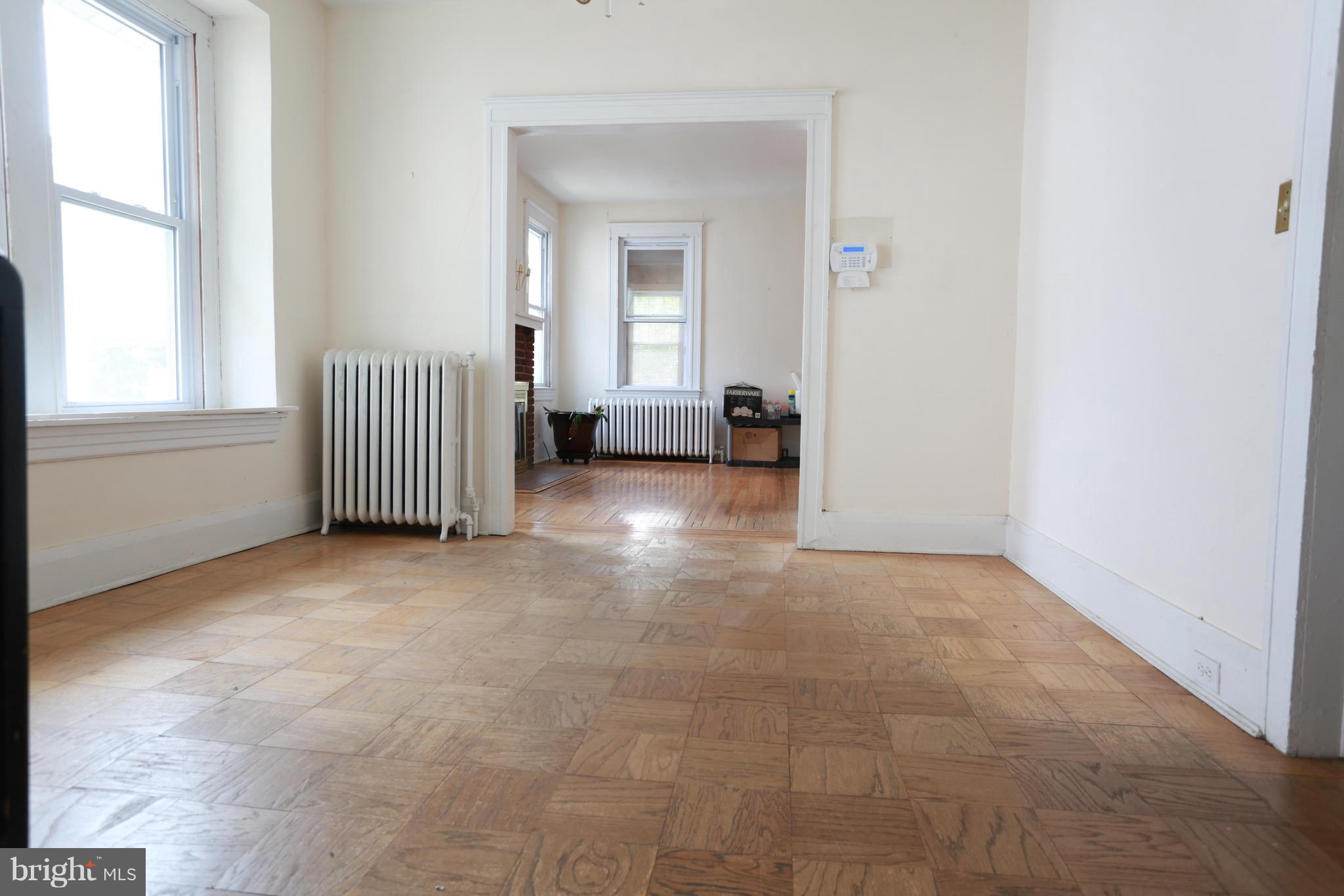 2317 Monticello Road Baltimore, MD 21216 - Photo 14 of 30 a view of a livingroom with a staircase
