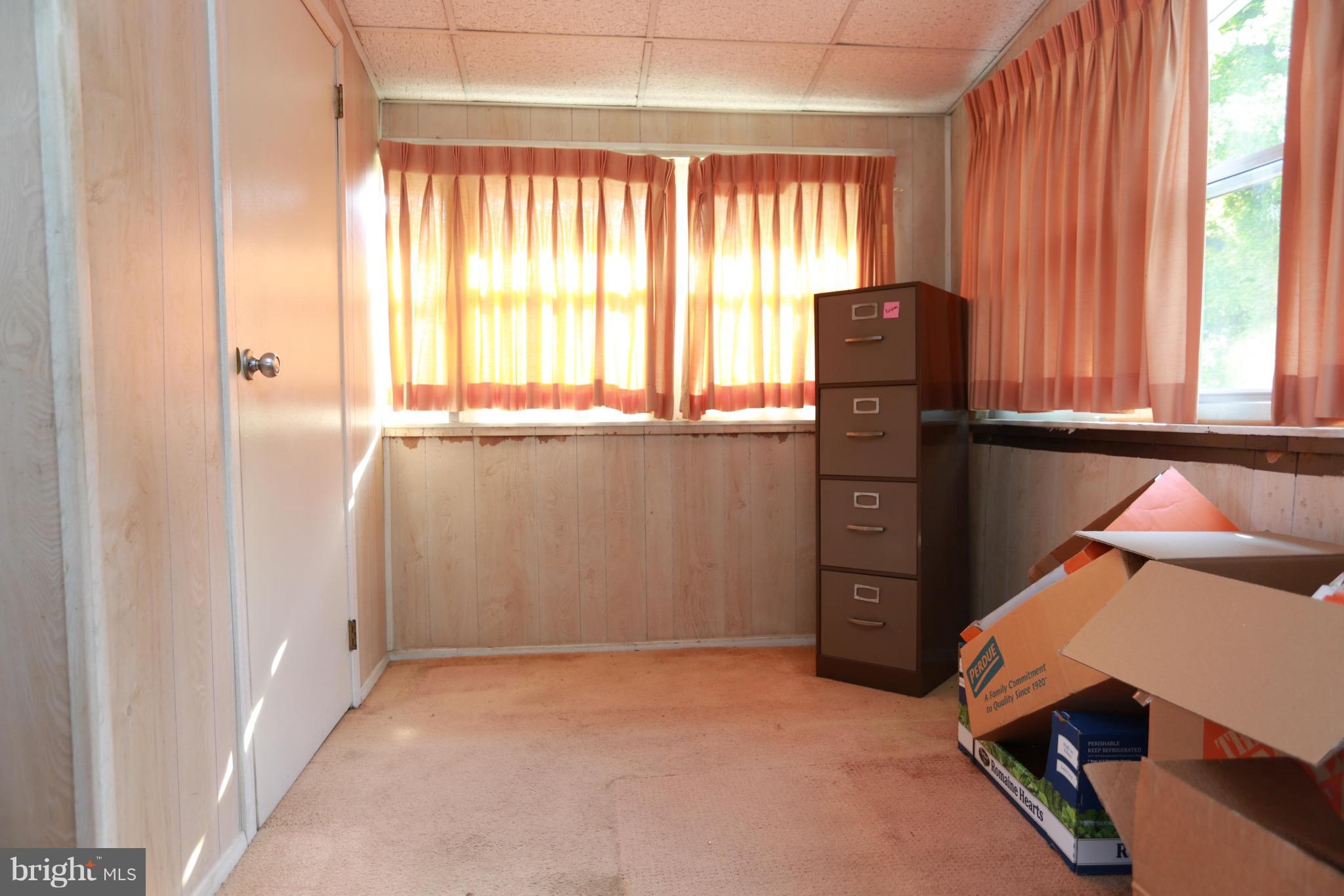2317 Monticello Road Baltimore, MD 21216 - Photo 25 of 30 a view of an empty room with a window