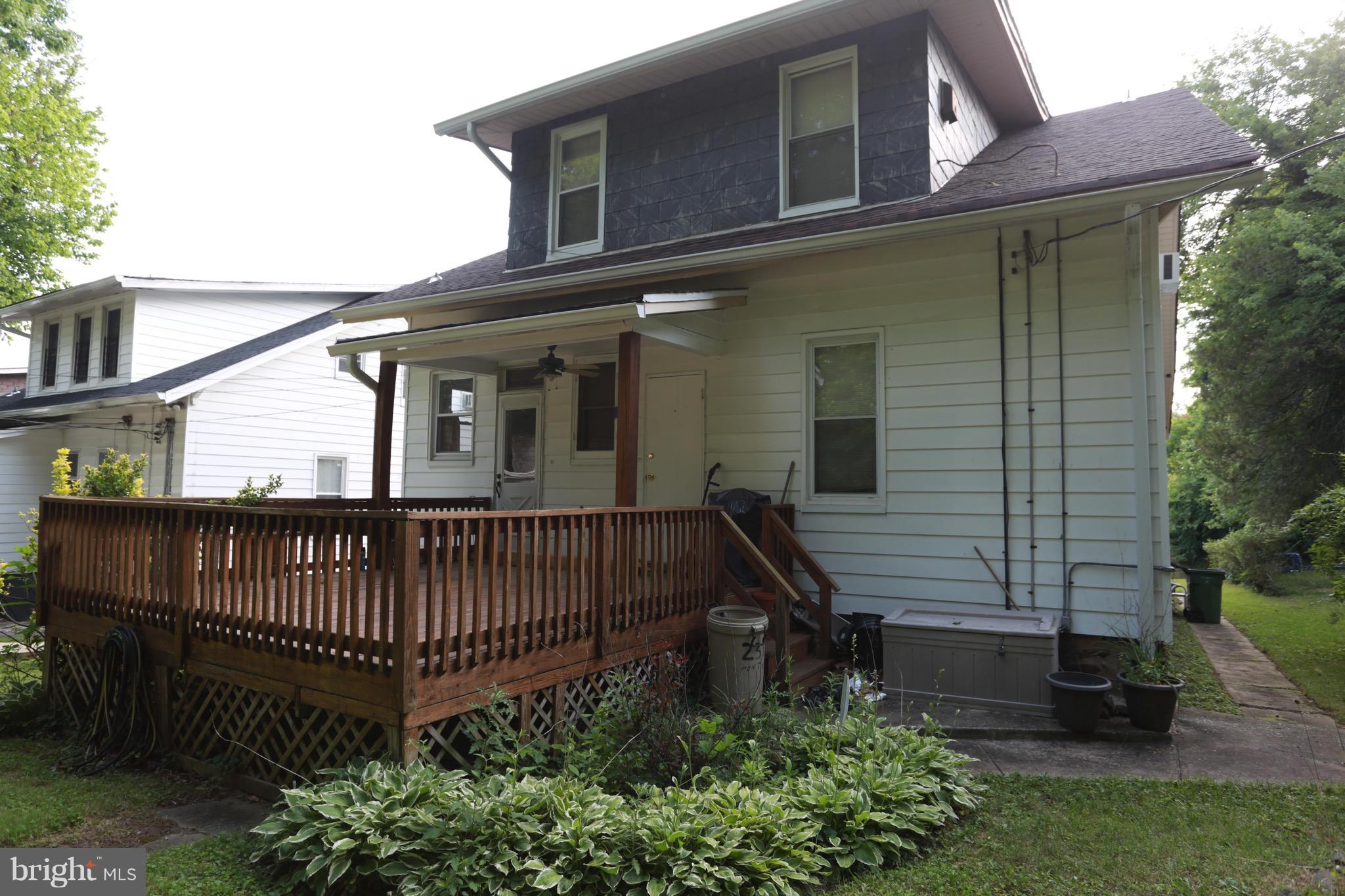 2317 Monticello Road Baltimore, MD 21216 - Photo 29 of 30 a view of a house with a yard and deck