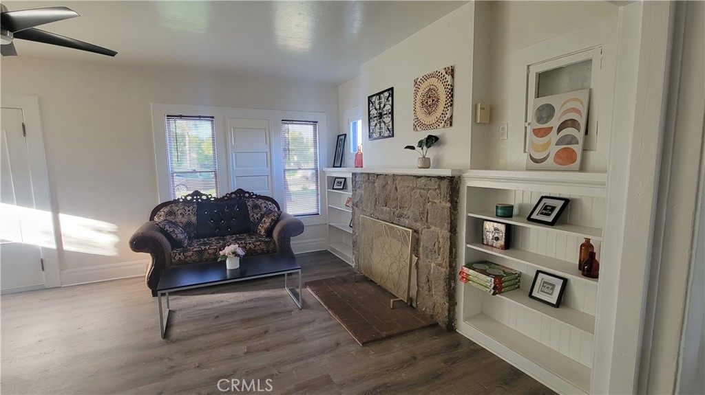 503 West Colton Avenue Redlands, CA 92374 - Photo 2 of 18 a living room with furniture and a window