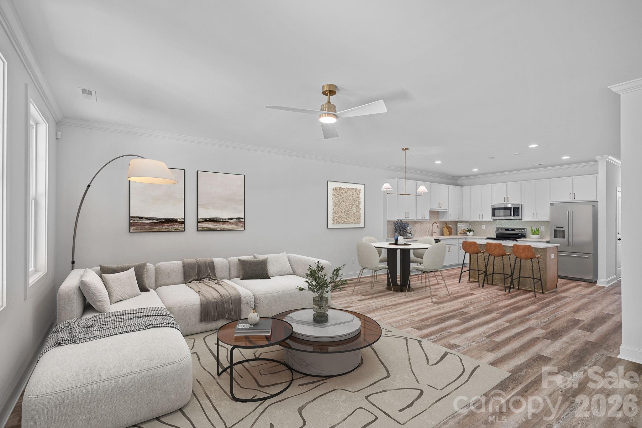 4015 Sofley Road Charlotte, NC 28206 - Photo 11 of 41 a living room with furniture a rug and kitchen view