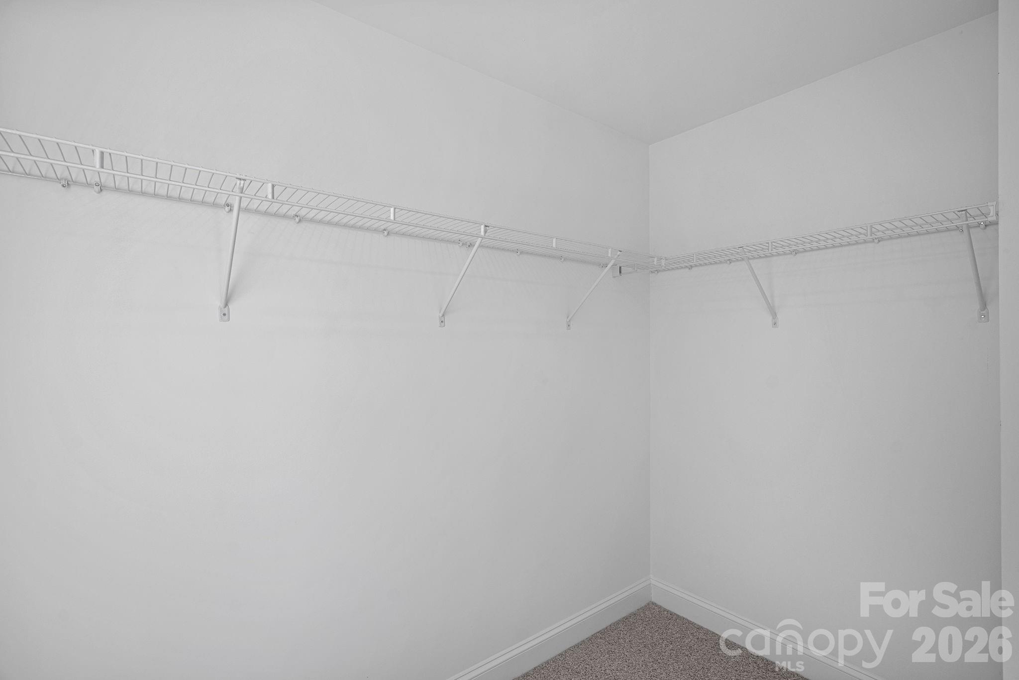 4015 Sofley Road Charlotte, NC 28206 - Photo 23 of 41 a view of a room with racks on the wall