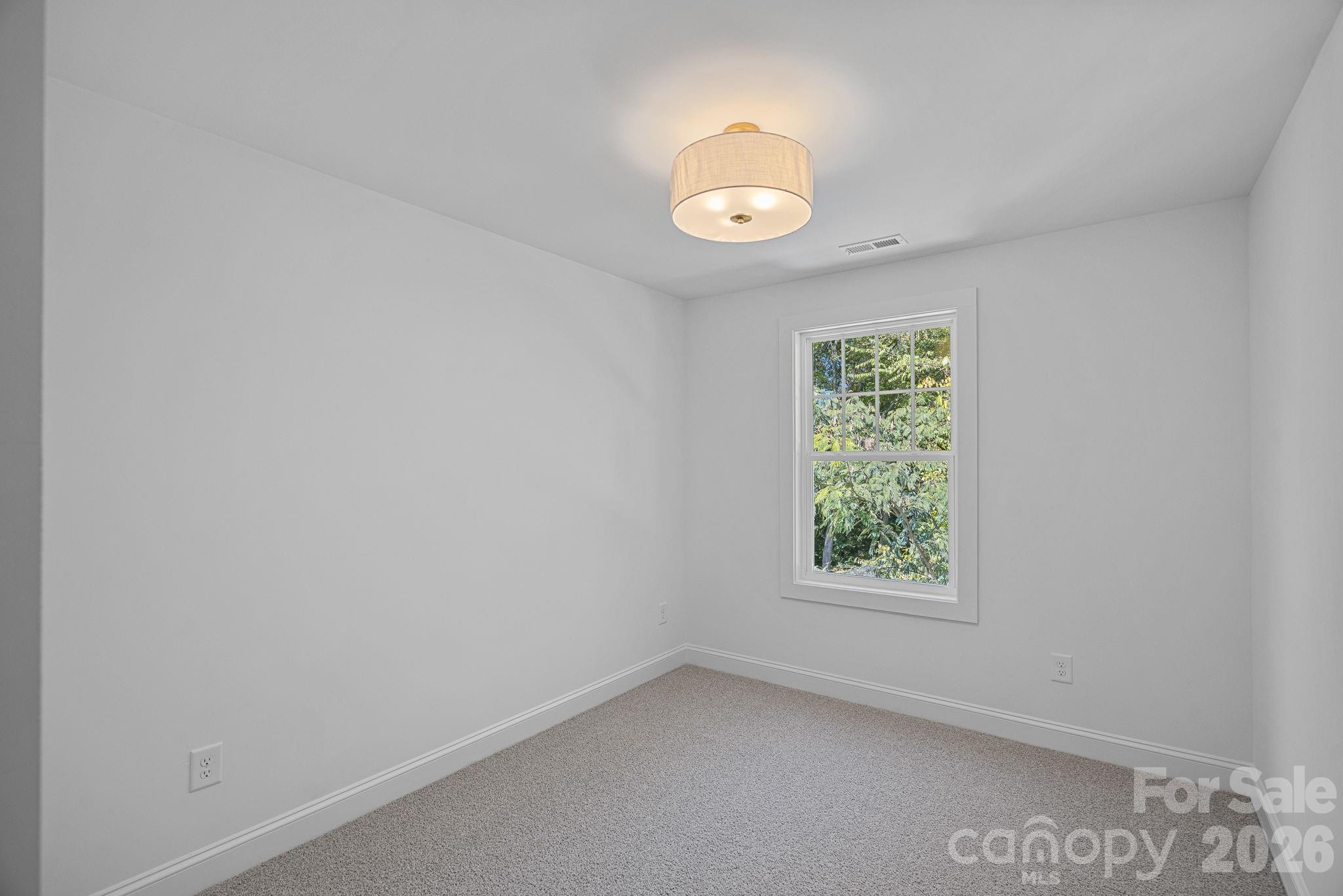 4015 Sofley Road Charlotte, NC 28206 - Photo 28 of 41 an empty room with window