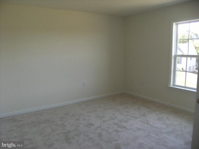 783 Rivanna Run Falling Waters, WV 25419 - Photo 14 of 30 an empty room with a window
