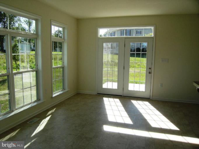 783 Rivanna Run Falling Waters, WV 25419 - Photo 22 of 30 a view of empty room with front door